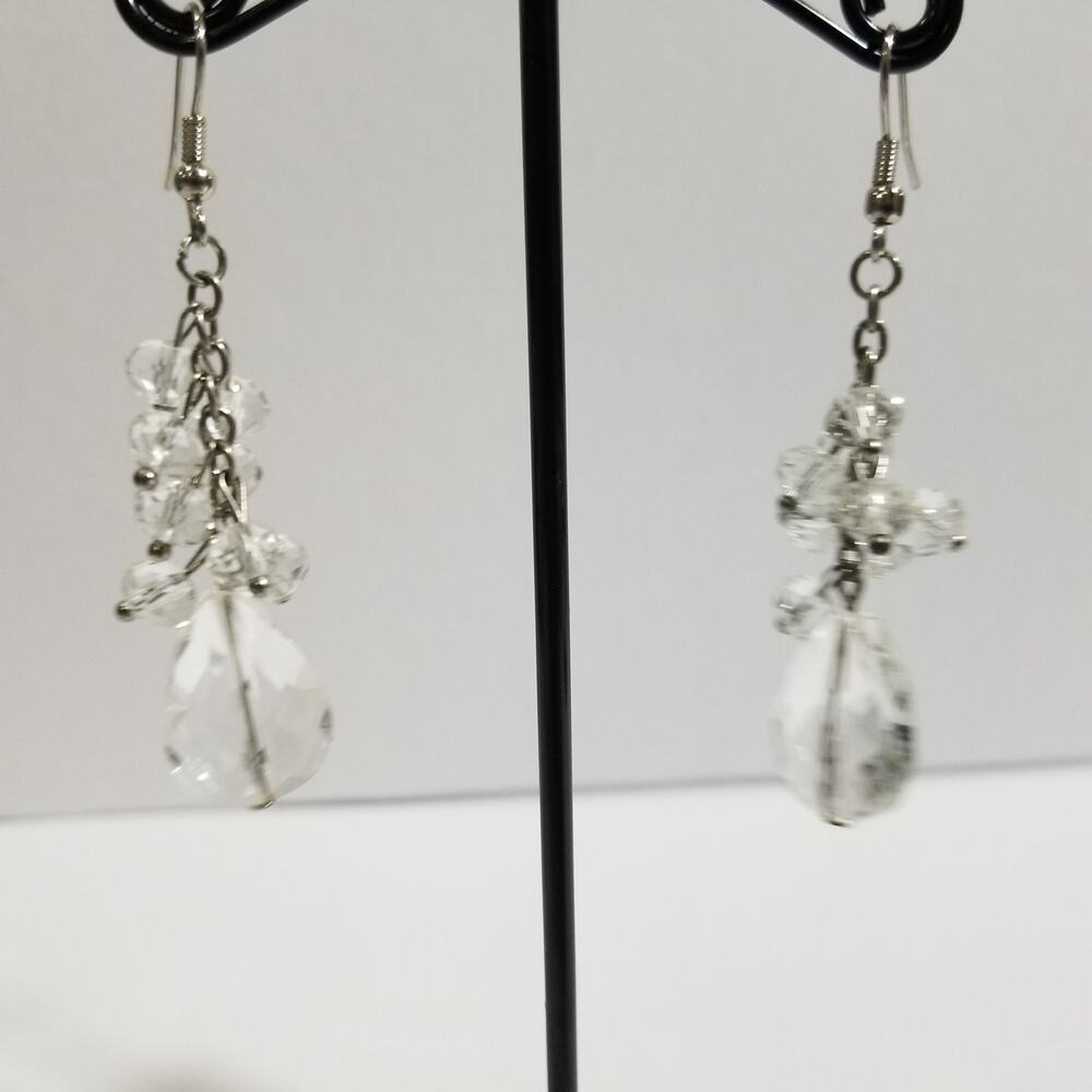 Clear two inch crystals cluster eight small crystals one lar